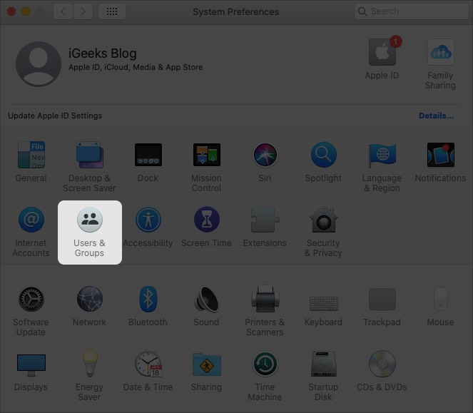 Ouvrez le menu Pomme et cliquez sur Utilisateur et groupes dans les préférences système Mac