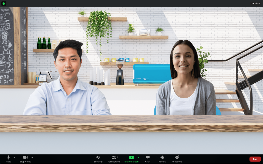 Visualizzazione immersiva di Zoom che mostra due partecipanti alla riunione in una singola scena del caffè virtuale
