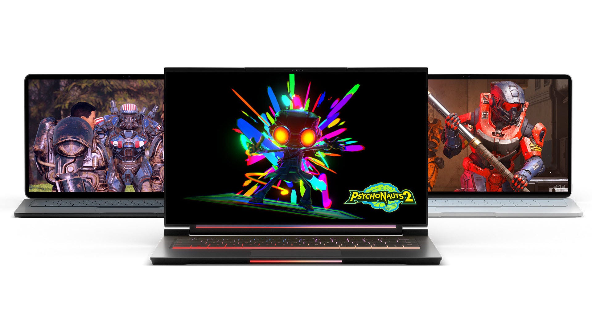 Tre laptop che giocano a giochi per PC