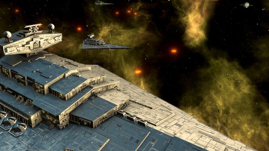 前線にあるスター・ウォーズのスター・デストロイヤー、その他背景に。レーザーが発射されます。」 width=