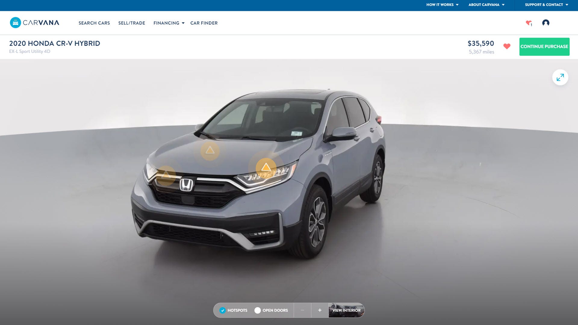 de Carvana-website, met een CR-V Hybrid met verschillende gele symbolen