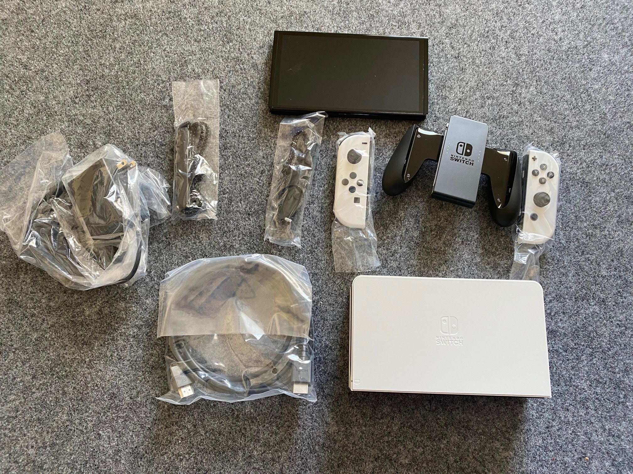 what's in the nintendo switch oled box