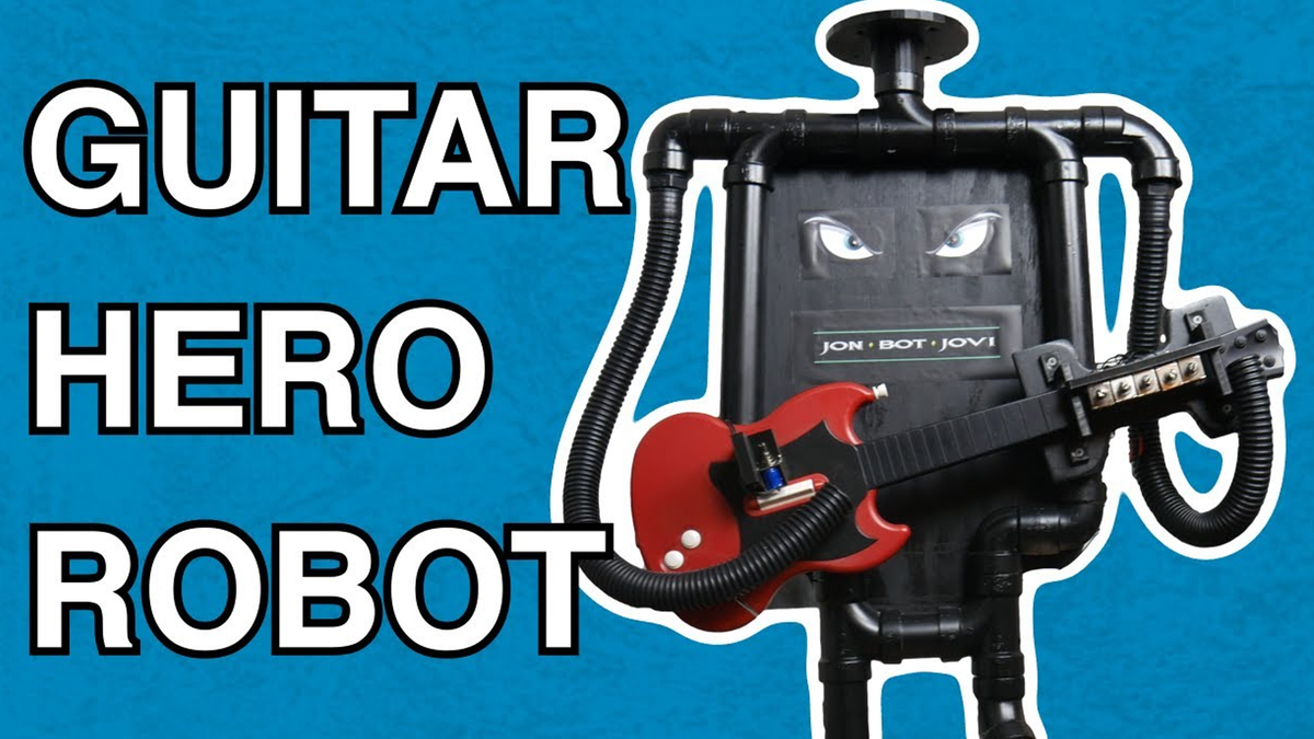 Robot grający na gitarze Jon Bot Jovi w akcji.