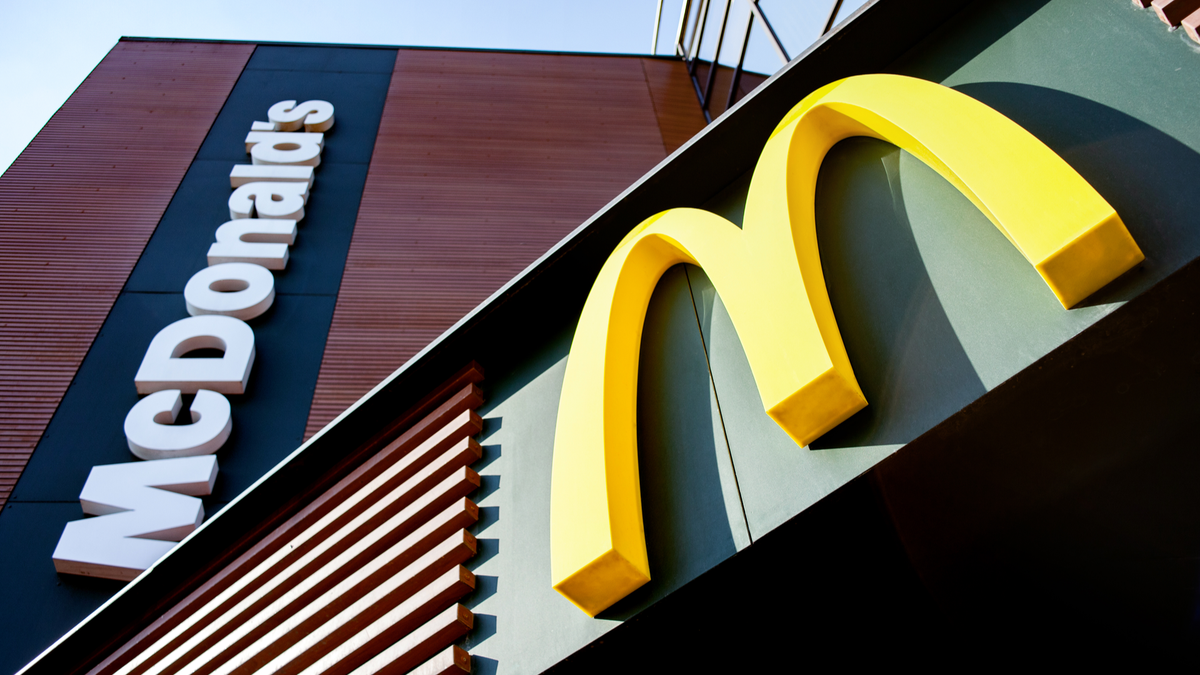 Skyward view of McDonald's logo on a building