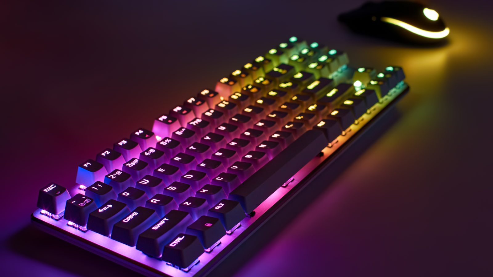 แป้นพิมพ์และเมาส์เล่นเกม RGB แบบไร้สายพร้อมไฟนีออนสว่าง