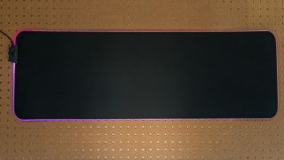 The XL version of the SteelSeries QCK Prism Cloth offers ample space and LEDs.