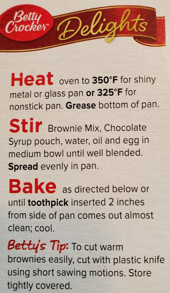 An image of the side of a Betty Crocker brownie mix box showing Betty’s Tip to use a plastic knife to slice through the warm baked goods.